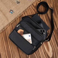 Saszetka męska skórzana na ramię miejska czarna skóra naturalna Abruzzo ABR-19. Czarne torby na ramię bez wzorów, ze skóry, na ramię, bez dodatków. Za 139.00 zł.