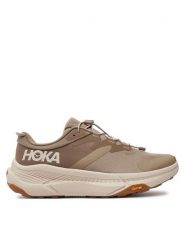 Hoka Sneakersy Transport 1123153 Brązowy. Brązowe buty sportowe casual HOKA, bez wzorów, z materiału, bez zapięcia. Za 599.99 zł.