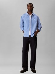 Calvin Klein Jeans koszula codzienna Mężczyźni Comfort Fit Bawełna (100%) niebieski, L. Niebieskie koszule Calvin Klein Jeans, na lato, l, bez wzorów, z bawełny, bez kołnierzyka, bez ramiączek. Za 409.95 zł.