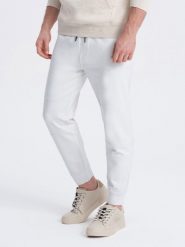 Męskie dresowe spodnie joggery na gumce z przeszyciami – białe V4 OM-PASK-0142 - XXL. Białe joggery i bojówki Ombre Clothing, m, z aplikacjami, z dresówki, wizytowe. W wyprzedaży za 89.99 zł.