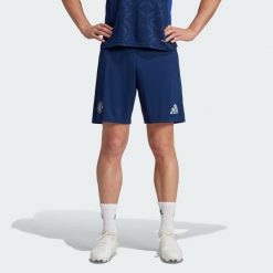 Szorty Manchester United 24/25 Away. Niebieskie krótkie spodenki sportowe Adidas, s, bez wzorów, z materiału. W wyprzedaży za 200.00 zł.