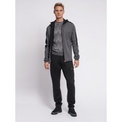 Hummel spodnie sortowe dresowe męskie Tropper Tapered Pants. Czarne szorty Hummel, m, bez wzorów, z dresówki, sportowe. Za 130.00 zł.
