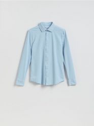 Koszula super slim fit - jasnoniebieski. Niebieskie koszule Reserved, l, bez wzorów, z dzianiny, bez kołnierzyka, bez ramiączek. Za 119.99 zł.
