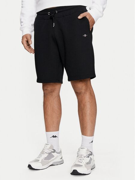 Gant Szorty sportowe Shield 2009027 Czarny Regular Fit. Czarne krótkie spodenki sportowe GANT, l, bez wzorów, z bawełny. Za 242.99 zł.