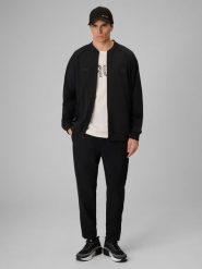 4F Spodnie casual męskie 4F x Robert Lewandowski - czarne XXL. Czarne spodnie materiałowe 4F, do pracy, m, bez wzorów, z tkaniny, biznesowe, długie. Za 229.99 zł.