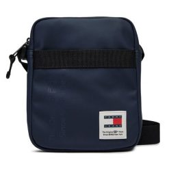 Saszetka Tommy Jeans. Niebieskie saszetki i nerki Tommy Jeans, bez wzorów, z jeansu. Za 149.99 zł.