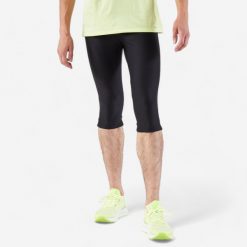 Legginsy do biegania krótkie męskie Kiprun Run 100. Czarne legginsy długie sportowe KALENJI, l, bez wzorów, z materiału, do biegania. Za 54.99 zł.
