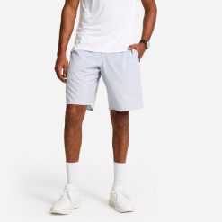 Spodenki fitness cardio męskie Domyos. Niebieskie szorty DOMYOS, m, bez wzorów, z materiału, sportowe. Za 79.99 zł.