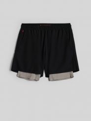 4F Spodenki treningowe szybkoschnące męskie - czarne M. Czarne krótkie spodenki sportowe 4F, l, bez wzorów, z materiału. Za 169.99 zł.