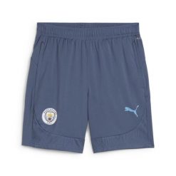 Spodenki treningowe Manchester City 2024/25. Niebieskie szorty Puma, xl, bez wzorów, sportowe. W wyprzedaży za 180.05 zł.