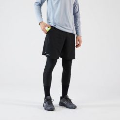 Spodenki - legginsy do tenisa 2w1 męskie Artengo Thermic. Czarne legginsy długie sportowe ARTENGO, m, bez wzorów, tenisowe. Za 149.99 zł.