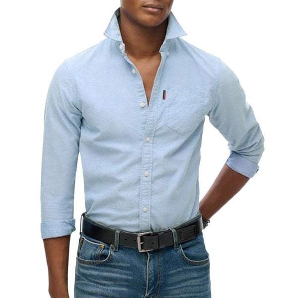 Wyblakana koszula Superdry Oxford. Niebieskie koszule Superdry, xl, bez wzorów, z bawełny, bez kołnierzyka, bez ramiączek. Za 295.45 zł.