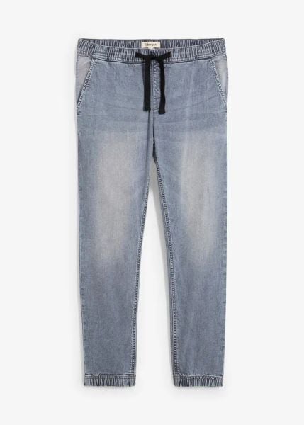 Joggery jeansowe o kroju regular fit z gumką w talii, tapered. Niebieskie jeansy bonprix, m. Za 149.99 zł.