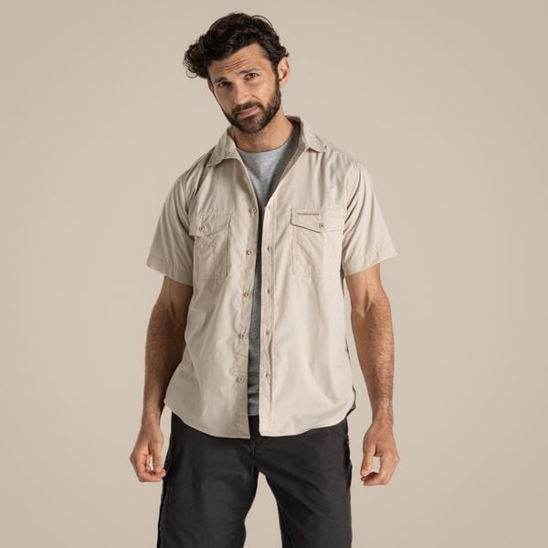 Koszula podróżnicza męska Craghoppers Kiwi SS Shirt. Białe koszule Craghoppers, l, bez wzorów, bez kołnierzyka, bez ramiączek. Za 156.99 zł.