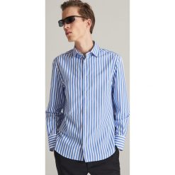 Koszula comfort fit w paski - Niebieski. Koszule marki Reserved. Za 69.99 zł.
