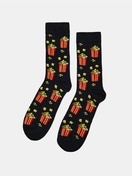 Prążkowane skarpetki z bawełną z motywem popcornu - czarny. Czarne skarpety Sinsay, bez wzorów, z bawełny. Za 15.99 zł.