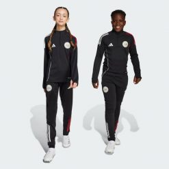 Spodnie treningowe Ajax Amsterdam Tiro 25 Competition. Białe spodnie treningowe długie Adidas, bez wzorów. Za 259.00 zł.