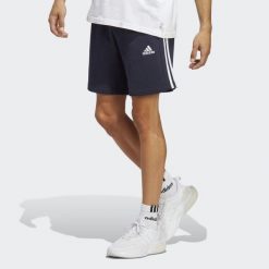 Spodenki krótkie męskie adidas Essentials French Terry 3-Stripes. Czarne krótkie spodenki sportowe Adidas, m, bez wzorów, z bawełny. Za 120.99 zł.