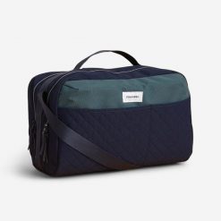 Torba jeździecka na przybory Fouganza 22 l. Niebieskie torby na ramię FOUGANZA, bez wzorów, z materiału, na ramię, duże, matowe, bez dodatków. Za 169.99 zł.