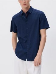 Strukturalna koszula regular fit - granatowy. Niebieskie koszule Reserved, l, bez wzorów, z bawełny, bez kołnierzyka, bez ramiączek. Za 119.99 zł.
