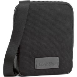 Saszetka CALVIN KLEIN - Modern Bound Mini Reporter K50K503442 Czarny. Saszetki i nerki marki CALVIN KLEIN. W wyprzedaży za 239.00 zł.