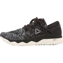 Reebok FLOATRIDE RUN ULTK Obuwie do biegania treningowe black/coal/white. Buty treningowe marki Reebok, z materiału. W wyprzedaży za 389.40 zł.