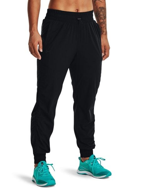 Under Armour Spodnie dresowe w kolorze czarnym rozmiar: XS. Czarne spodnie treningowe długie Under Armour, xs, bez wzorów, z dresówki. Za 98.33 zł.