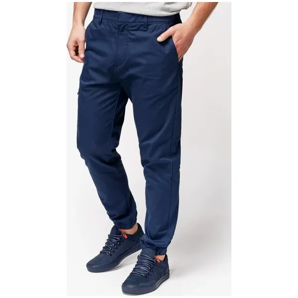 Timberland Spodnie Lovell Lake Slim Tapered Utility Jogger , granatowy, rozmiar 30/32. Niebieskie joggery i bojówki Timberland, m, bez wzorów, z bawełny, klasyczne, z standardowym stanem. W wyprzedaży za 349.99 zł.