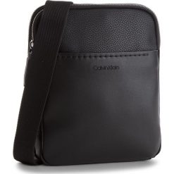 Saszetka CALVIN KLEIN - Multi Task P Flat Cr K50K503758 001. Czarne saszetki i nerki marki CALVIN KLEIN, ze skóry ekologicznej. Za 399.00 zł.