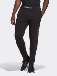 Adidas Spodnie dresowe "M Q4 BL PT" w kolorze czarno-pomarańczowym rozmiar: M. Czarne spodnie treningowe długie Adidas, m, z aplikacjami, z bawełny. Za 145.95 zł.