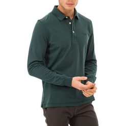 Koszulka polo w kolorze ciemnozielonym. Bezrękawniki marki Galvanni. W wyprzedaży za 164.95 zł.