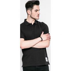 Calvin Klein Jeans - Polo. Koszulki polo marki Calvin Klein Jeans, z bawełny, polo, z krótkim rękawem. W wyprzedaży za 179.90 zł.