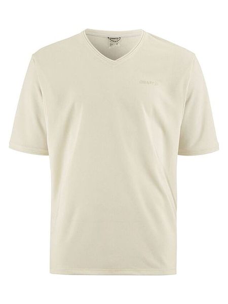 Craft Koszulka kolarska "Core Offroad XT" w kolorze kremowym rozmiar: L. Brązowe t-shirty sportowe Craft, bez wzorów, bez ramiączek, rowerowe. Za 94.95 zł.