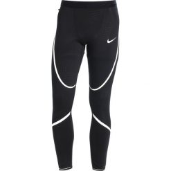 Nike Performance TECH Legginsy black/white/reflective silver. Spodnie treningowe długie marki Nike Performance, z elastanu. Za 259.00 zł.