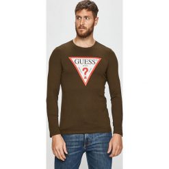 Guess Jeans - Longsleeve. Niebieskie bluzki z długim rękawem Guess, s, z aplikacjami, z jeansu, bez kołnierzyka, bez ramiączek. W wyprzedaży za 119.90 zł.