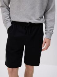 Dresowe szorty regular fit - czarny. Czarne krótkie spodenki sportowe Reserved, l, bez wzorów, z bawełny. Za 79.99 zł.