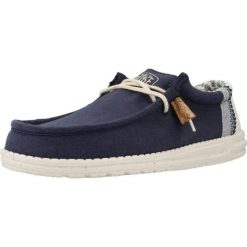 Buty HEY DUDE WALLY LINEN NATURAL Niebieski. Niebieskie buty turystyczne Hey dude, bez wzorów, z tkaniny, bez zapięcia, na fitness i siłownię. Za 333.95 zł.