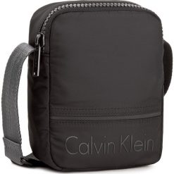 Saszetka CALVIN KLEIN BLACK LABEL - Matthew 2.0 Mini Rep K50K503703 001. Saszetki i nerki marki Calvin Klein Black Label. W wyprzedaży za 199.00 zł.