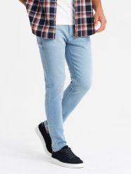 Dopasowane jeansowe spodnie męskie SLIM FIT z elastanem – błękitne V3 OM-PADP-0214 - XXL. Niebieskie spodnie materiałowe Ombre Clothing, na co dzień, l, bez wzorów, z bawełny, casualowe. Za 119.99 zł.