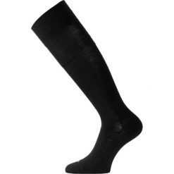 Skarpety merino FWK. Niebieskie skarpety LASTING, bez wzorów, z elastanu. Za 78.00 zł.