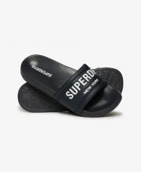 Superdry City Luxe Pool Sliders - klapki z wyściełanym paskiem – EBONY. Brązowe klapki Superdry, z poliesteru. Za 87.60 zł.