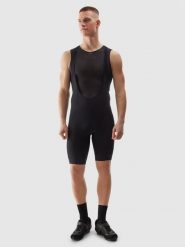 4F Spodenki rowerowe z szelkami męskie - czarne S. Czarne krótkie spodenki sportowe 4F, l, bez wzorów, z dzianiny, rowerowe. W wyprzedaży za 139.99 zł.