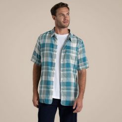 Koszula Craghoppers Argino. Niebieskie koszule Craghoppers, m, bez wzorów, bez kołnierzyka, bez ramiączek. Za 305.70 zł.