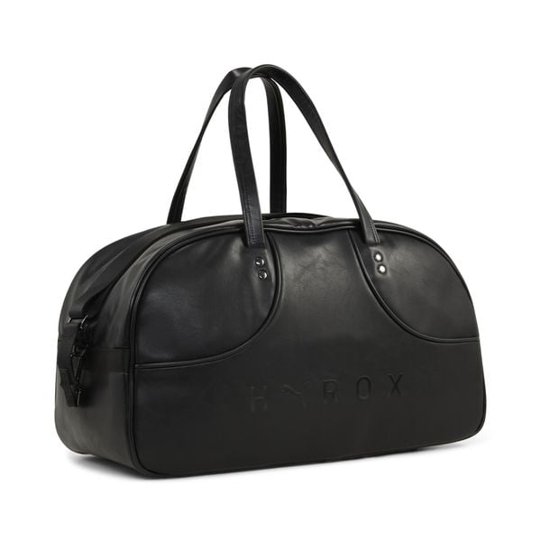 Torba z uchwytem PUMA x HYROX 38 l PUMA. Czarne torby na ramię Puma, bez wzorów, na ramię, bez dodatków. Za 409.00 zł.