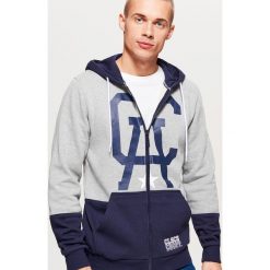 Rozpinana bluza z kapturem CLASSIC - Jasny szary. Bluzy z kapturem marki DOMYOS. Za 129.99 zł.