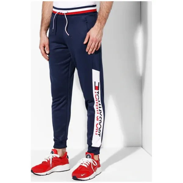 Tommy Sport Spodnie Jogger 251 , granatowy, rozmiar M. Niebieskie joggery i bojówki Tommy Hilfiger, m, bez wzorów, z bawełny, biznesowe. W wyprzedaży za 319.99 zł.