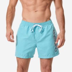Spodenki surfingowe męskie Quiksilver Til Aqua krótkie 15". Niebieskie odzież kąpielowa Quiksilver, m, bez wzorów, z poliesteru, sportowe. Za 179.99 zł.