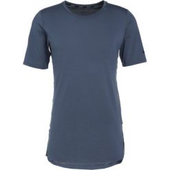 Nike Performance UTILITY Tshirt basic thunder blue/black. T-shirty marki Nike Performance, z elastanu. W wyprzedaży za 135.15 zł.