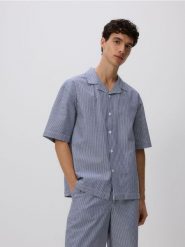 Bawełniana koszula comfort fit - granatowy. Niebieskie koszule Reserved, l, bez wzorów, z bawełny, bez kołnierzyka, bez ramiączek. Za 129.99 zł.