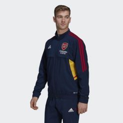 Kurtka do piłki nożnej męska Adidas Arsenal Presentation Condivo 2022/23. Niebieskie kurtki Adidas, l, bez wzorów, z dresówki, bez kaptura. Za 319.85 zł.